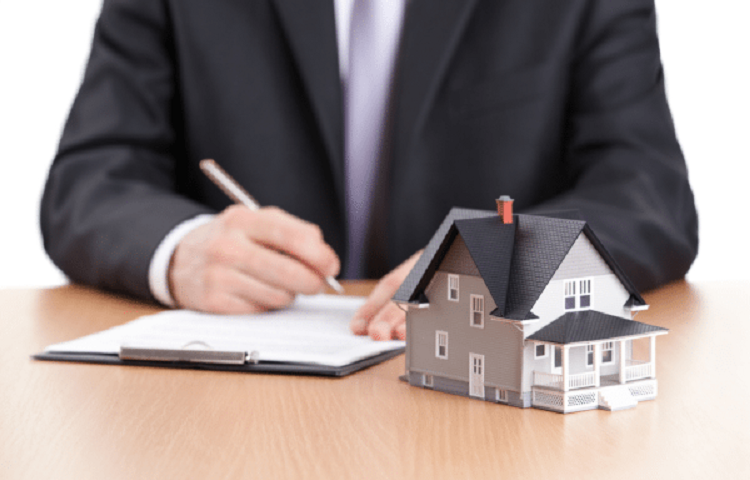 man making notes about home purchase