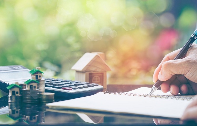 person writing about financing